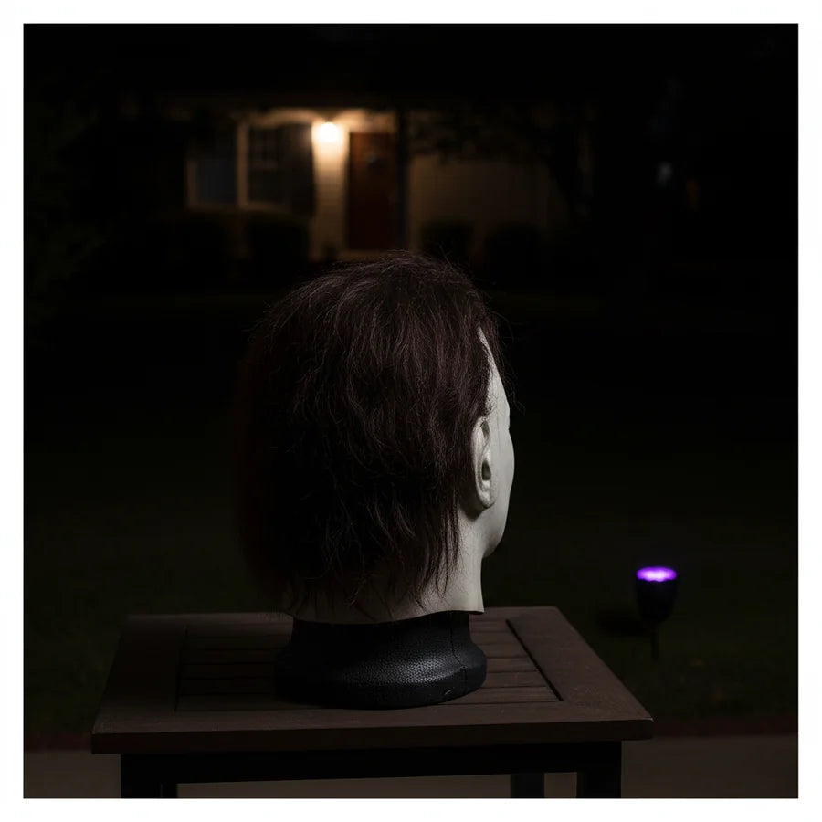 Cindervale Figure on a porch at night