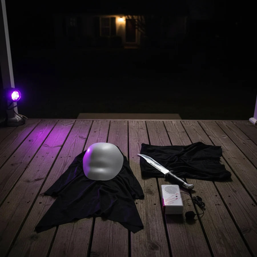 Dreadmoor Figure, costume kit laid out on a porch at night