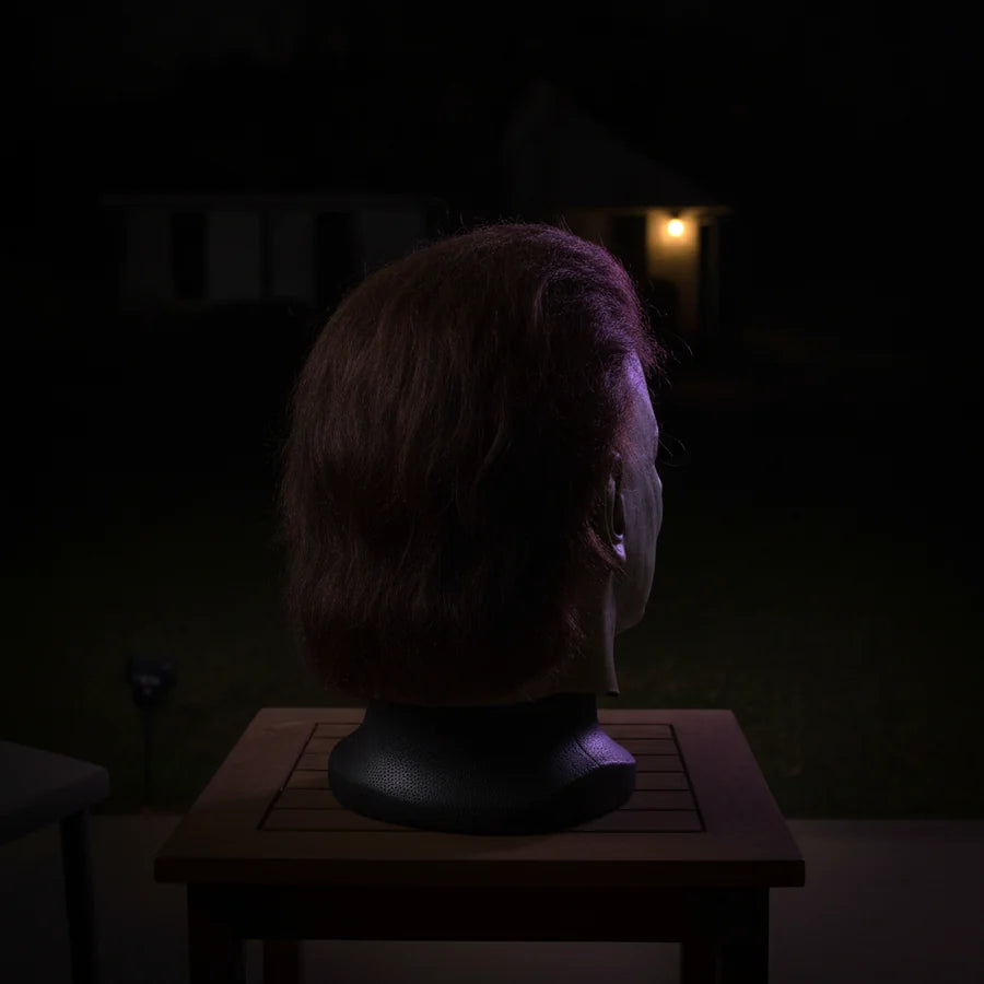 Nightfell Figure on a porch at night