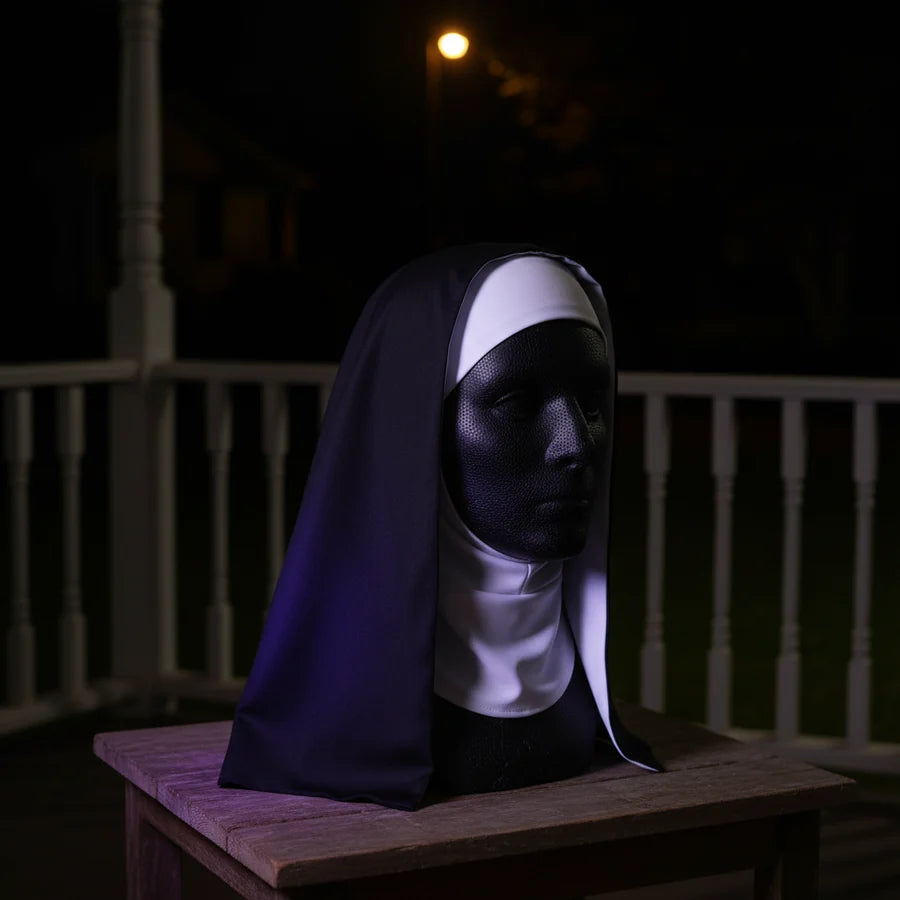 Sister Shadow Mask on a porch at night